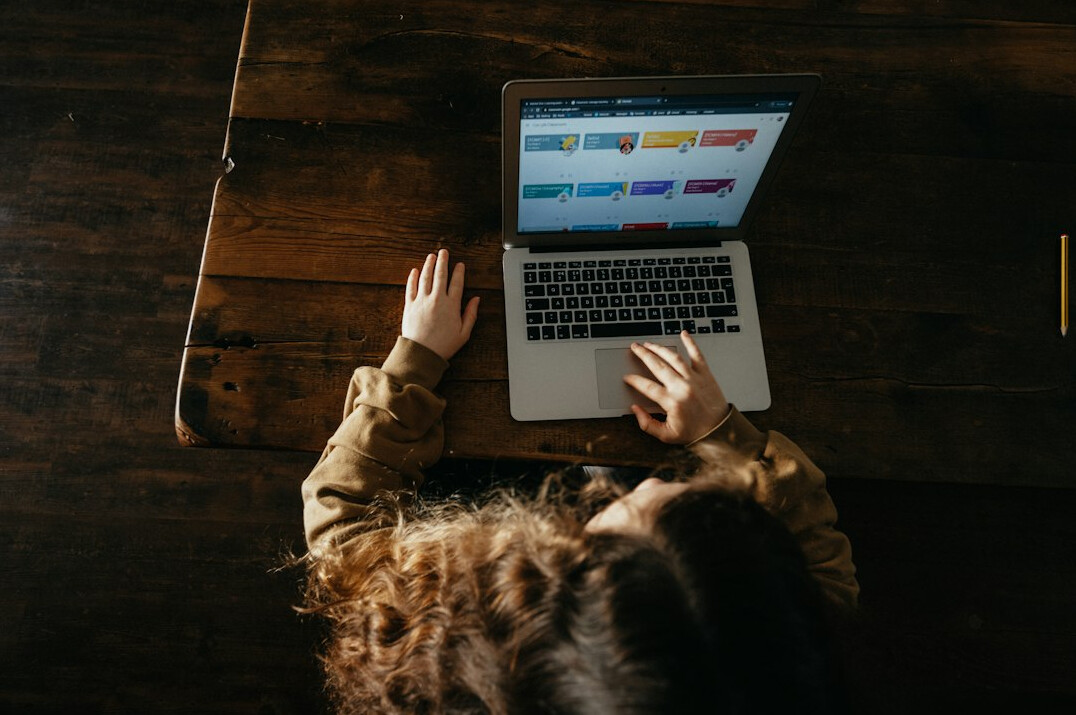 child excited at computer