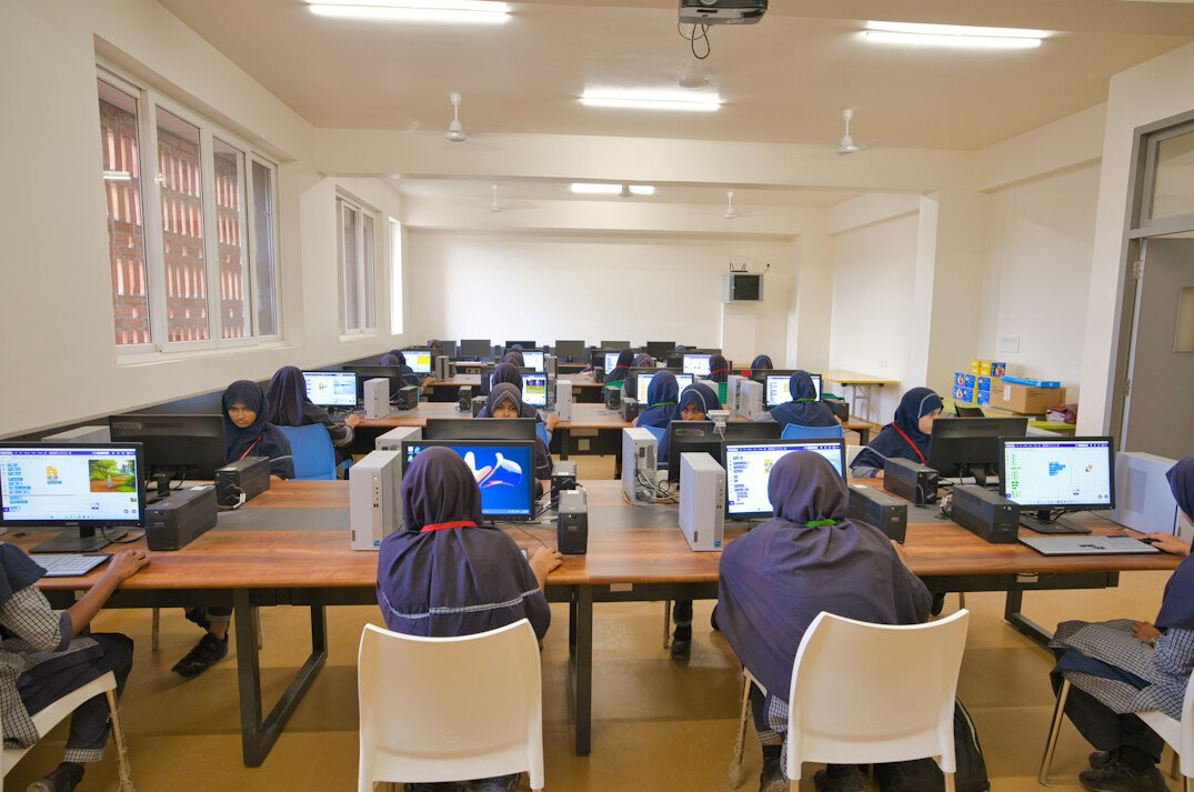 group of students learning to code